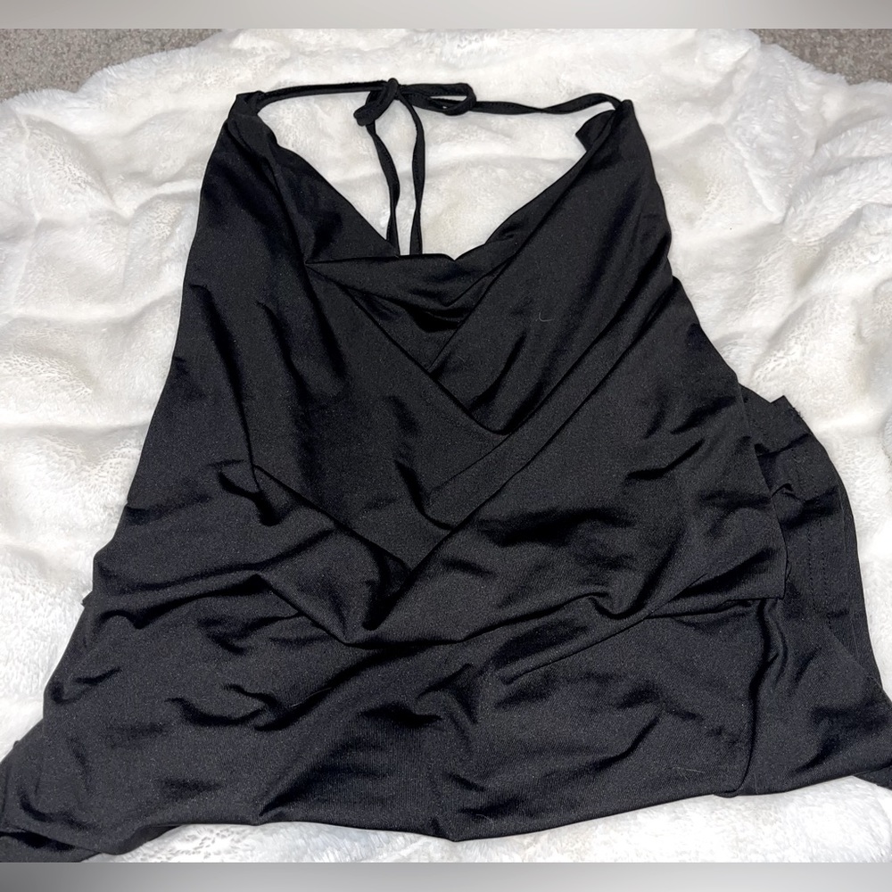 Birthday dress-slit down both sides and back is open. Dress ties across the neck